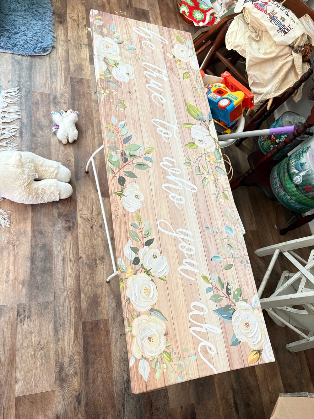 Floral sign with White Script